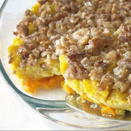 Polenta medallions with mushrooms and smoked provola